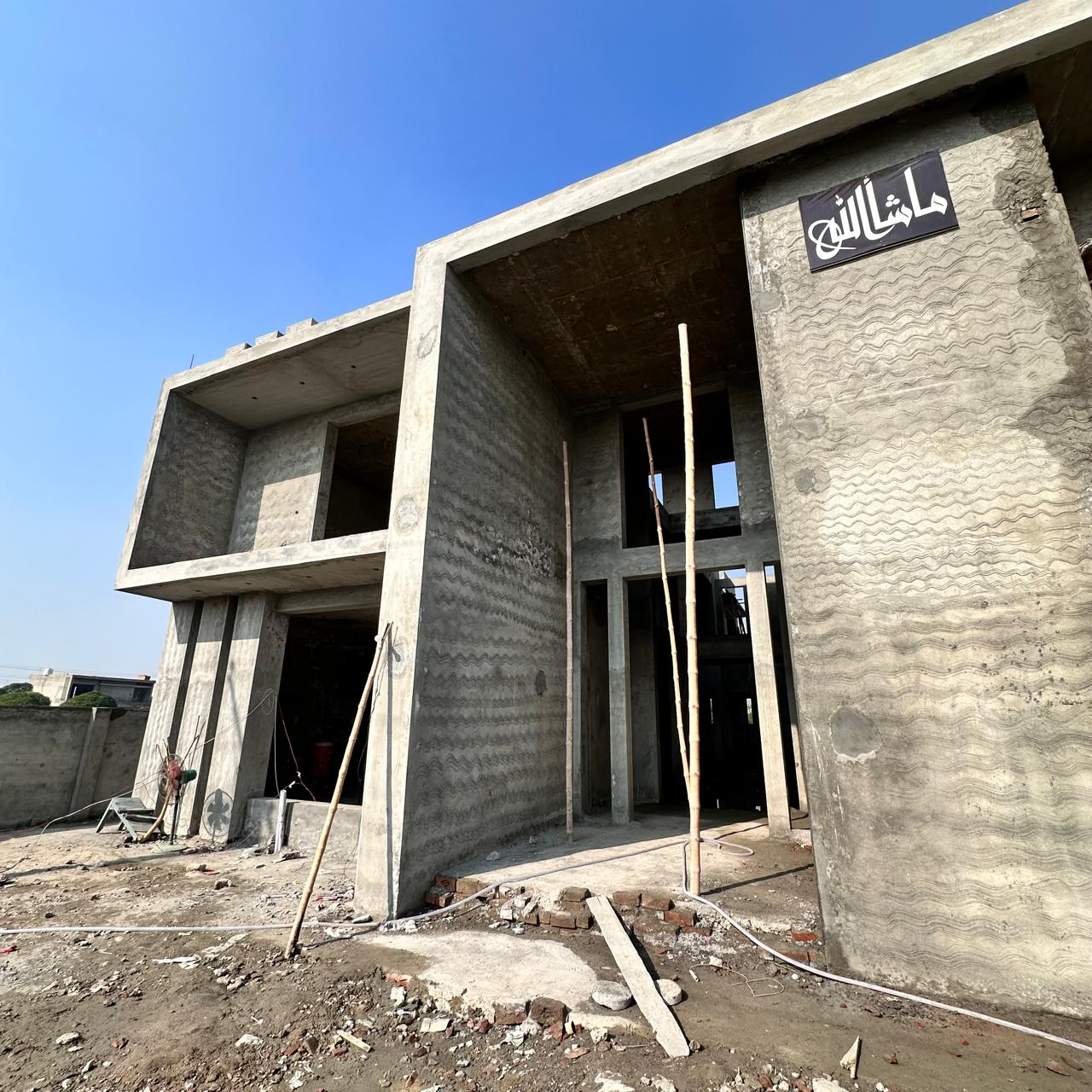 Facade of a Ghazi Construction project under construction in Lahore